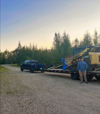 20260817 standing by trailer with mulcher and skid steer